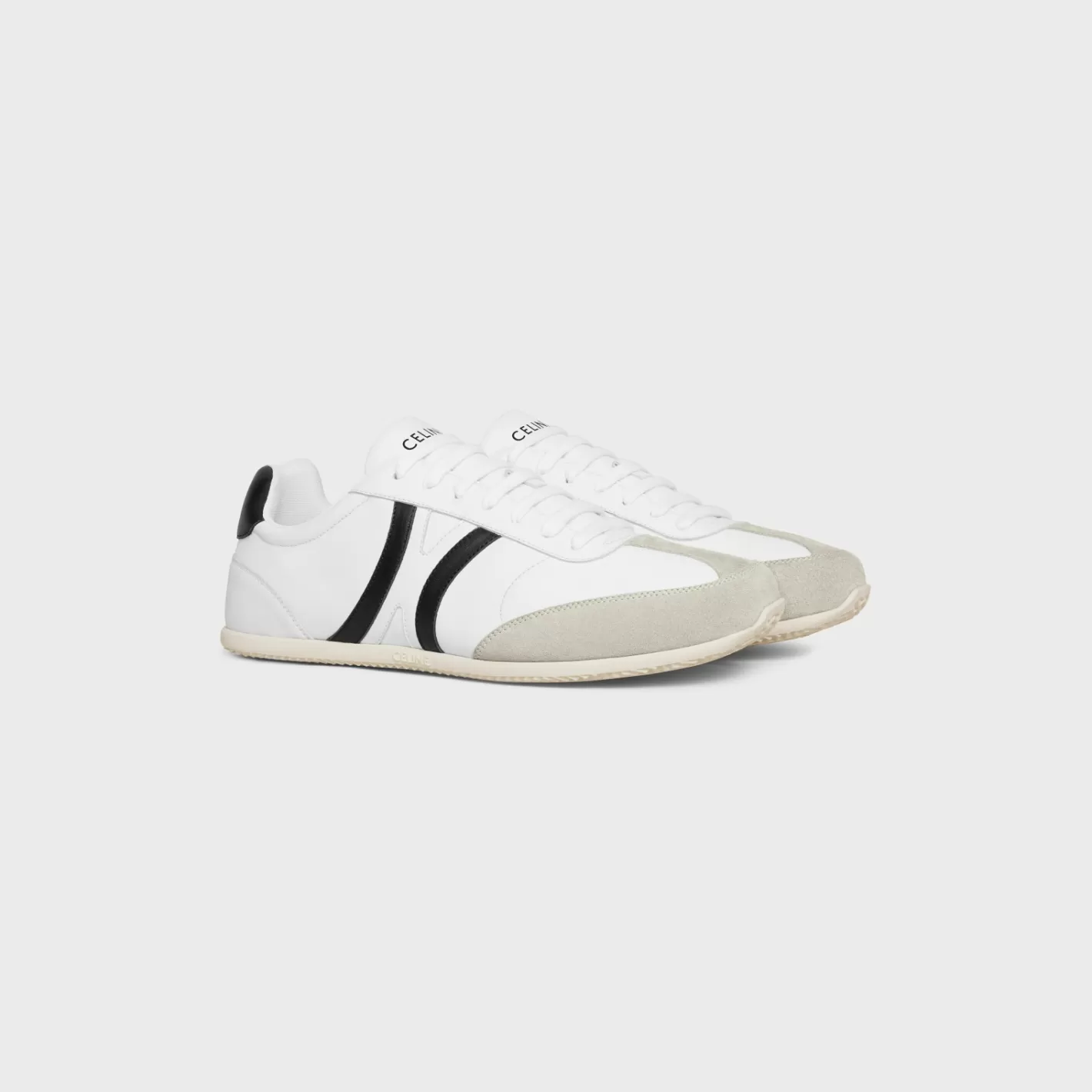 Shop CELINE JOGGER LOW LACE-UP SNEAKER WITH TRIOMPHE in CALFSKIN AND SUEDE CALFSKIN OPTICWHITE/GREY/BLACK