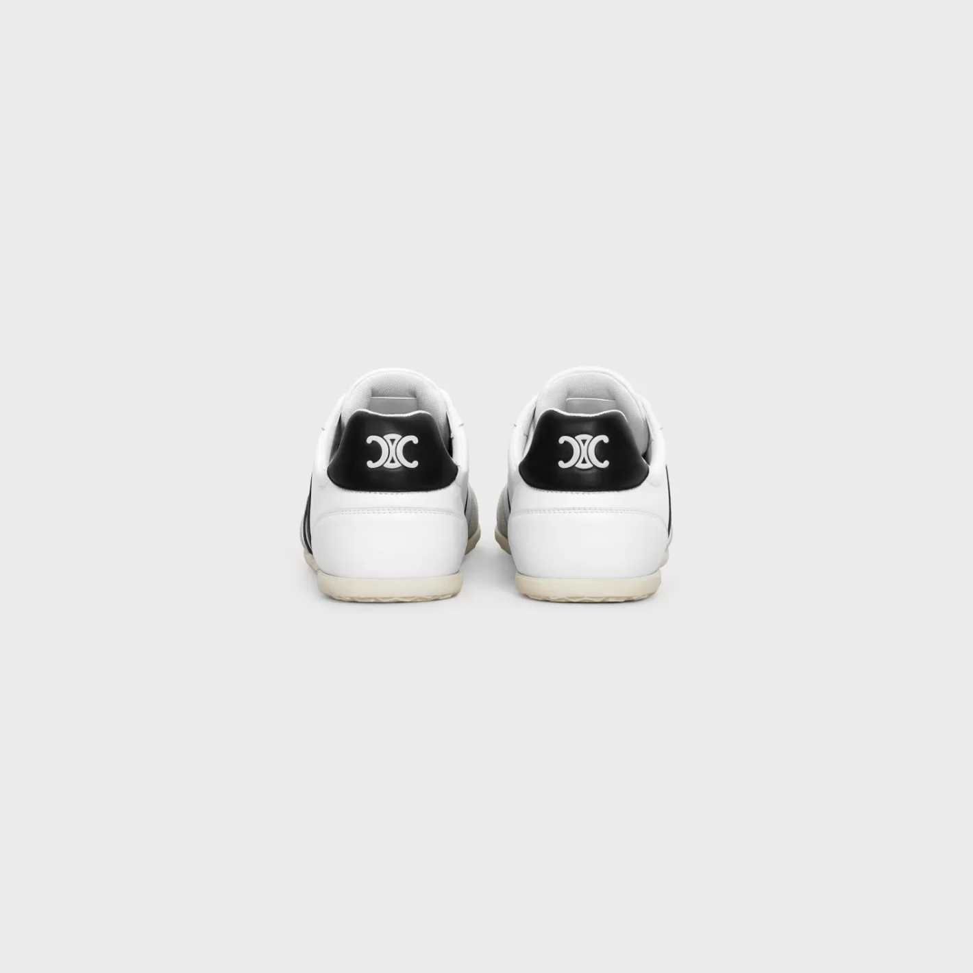 Shop CELINE JOGGER LOW LACE-UP SNEAKER WITH TRIOMPHE in CALFSKIN AND SUEDE CALFSKIN OPTICWHITE/GREY/BLACK