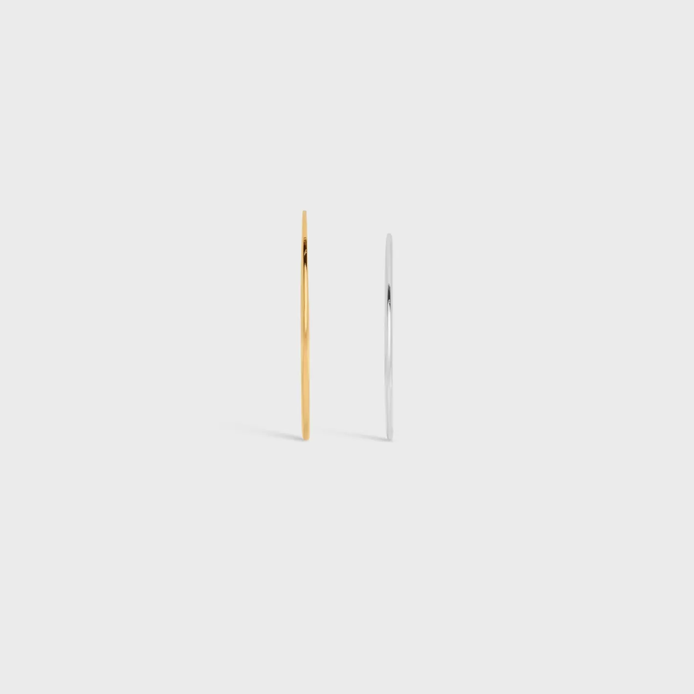 Shop CELINE Formes Abstraites Set of 2 Cuffs in Brass with Gold and Rhodium Finish GOLD/SILVER