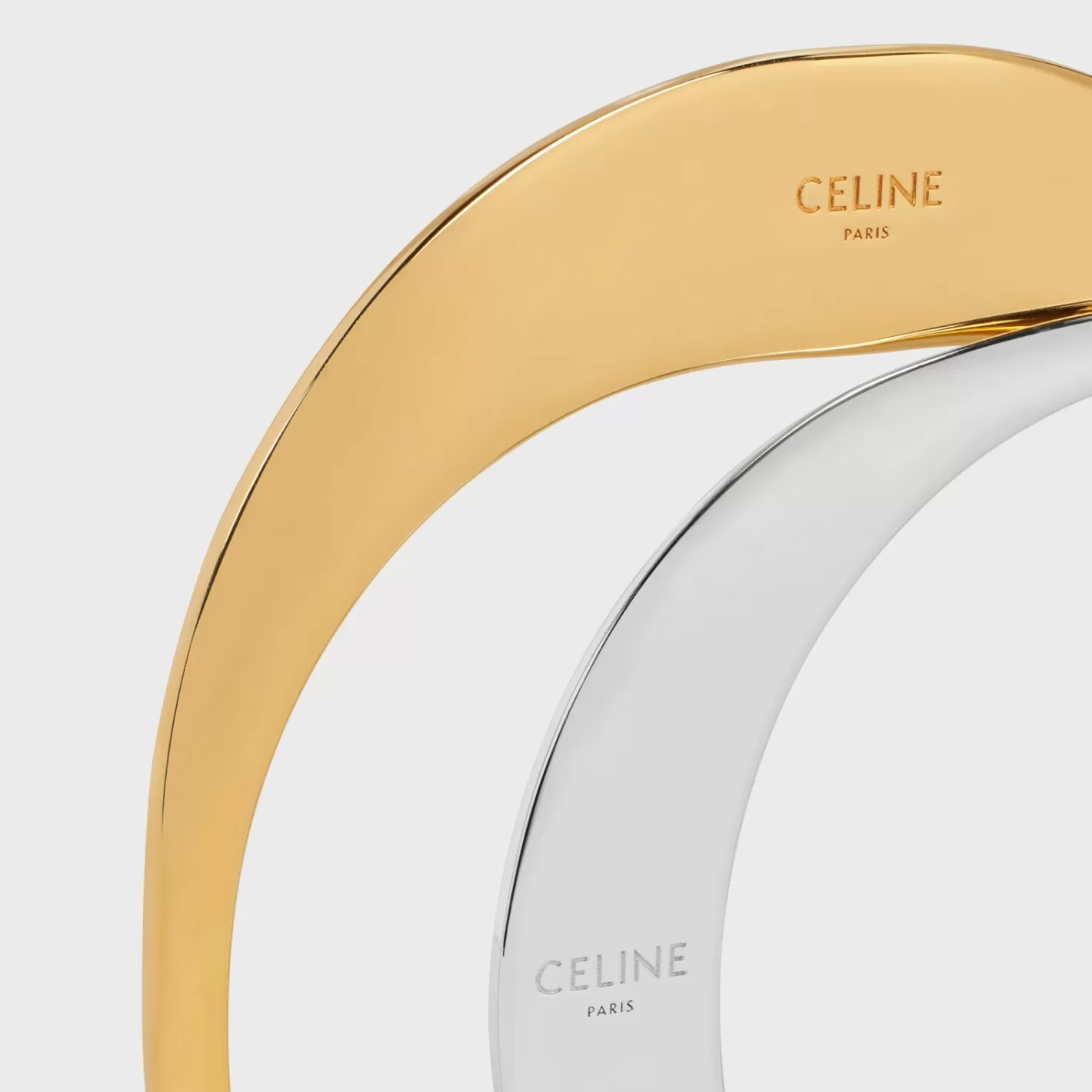 Shop CELINE Formes Abstraites Set of 2 Cuffs in Brass with Gold and Rhodium Finish GOLD/SILVER