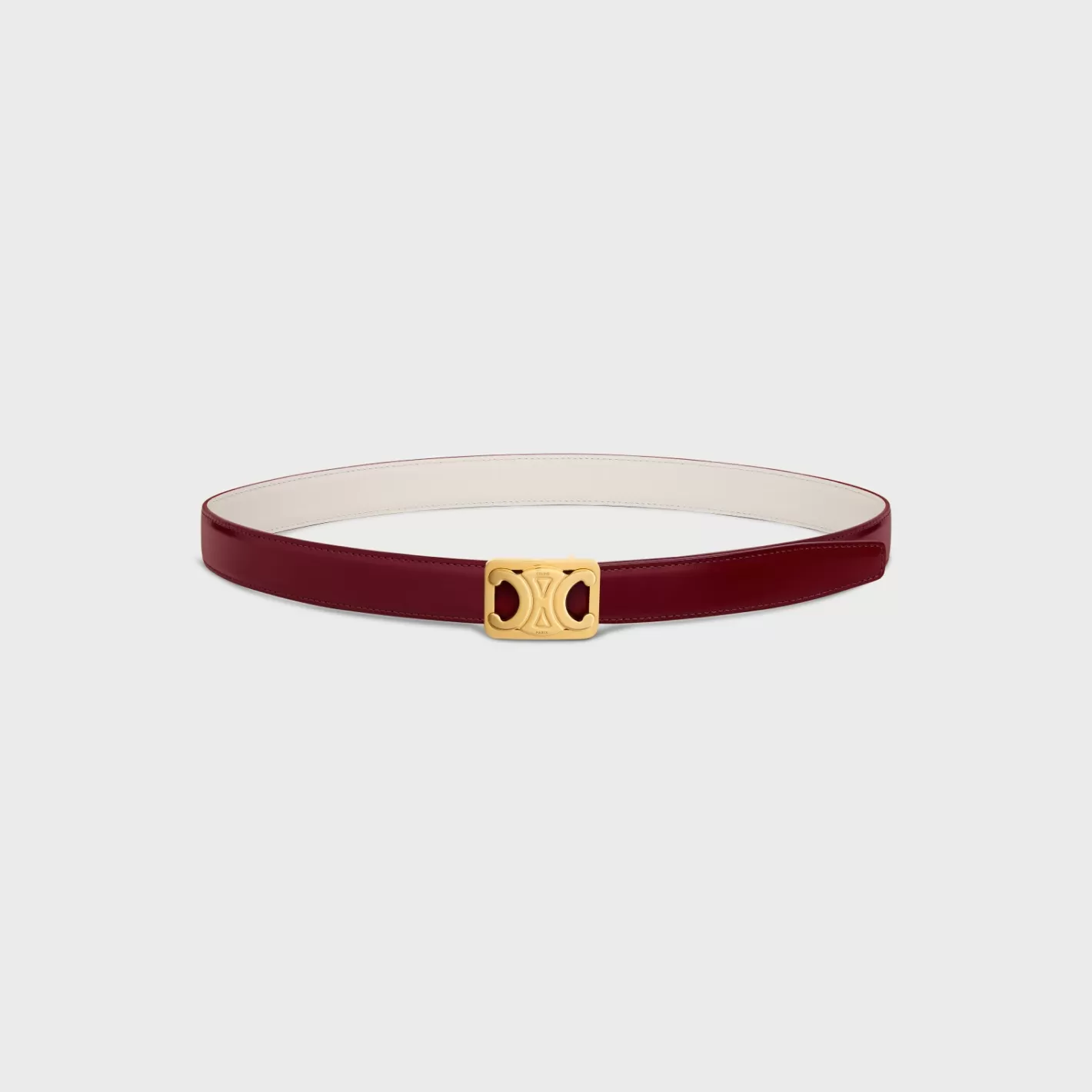 Shop CELINE MEDIUM REVERSIBLE FRAMED TRIOMPHE BELT in TAURILLON AND NATURAL CALFSKIN LIGHTBURGUNDY/WHITECOTTON